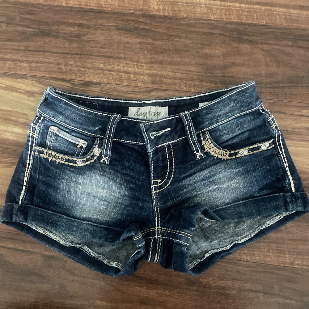 Daytrip Denim blue jean shorts with sequins and diamond buttons from Buckle